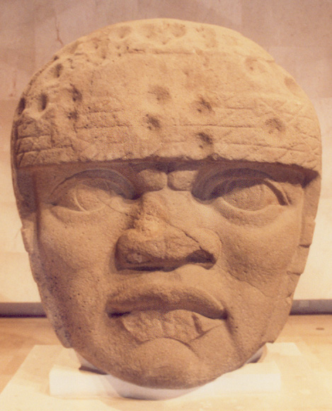 What are some characteristics of Olmec architecture?